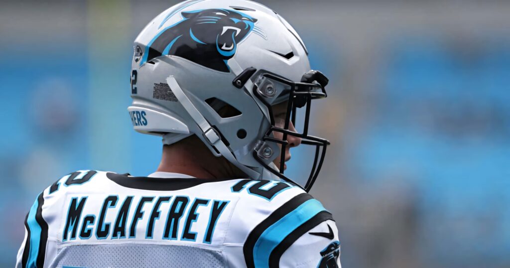 Christian McCaffrey running back Carolina Panthers in white blue uniform high resolution action shot Wallpaper