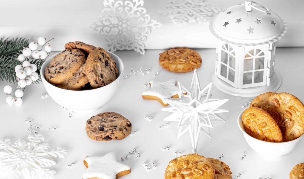 Festive Delights: A Captivating Christmas Spread of Cookies and Biscuits Wallpaper