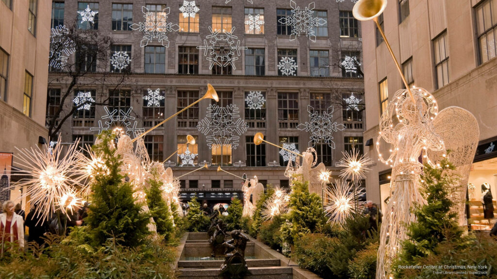 Angel-Adorned Festivities: Joyous Christmas Exuberance in Rockefeller Center's Enchanted Garden
Wallpaper