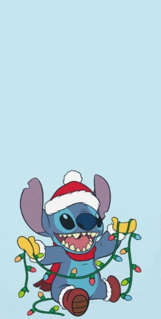 Adorable Stitch in Santa Hat Joyfully Playing with Christmas Lights Wallpaper