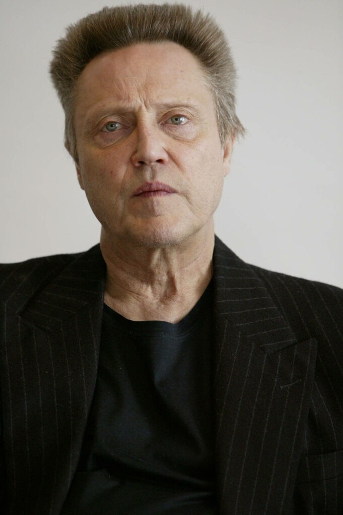 Christopher Walken intense portrait sharp gaze natural light minimalist wallpaper background