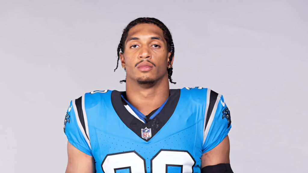 Chuba Hubbard portrait in Carolina Panthers uniform sharp focus blue and black high-resolution wallpaper