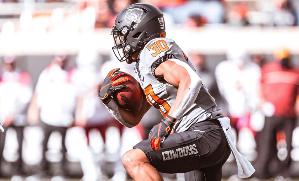 Chuba Hubbard Oklahoma State Cowboys running back in action dynamic football wallpaper background