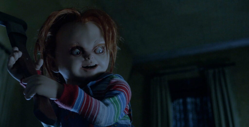 Chucky's Menace Unleashed: A Deadly Doll's Quest for Vengeance in QHD Wallpaper
