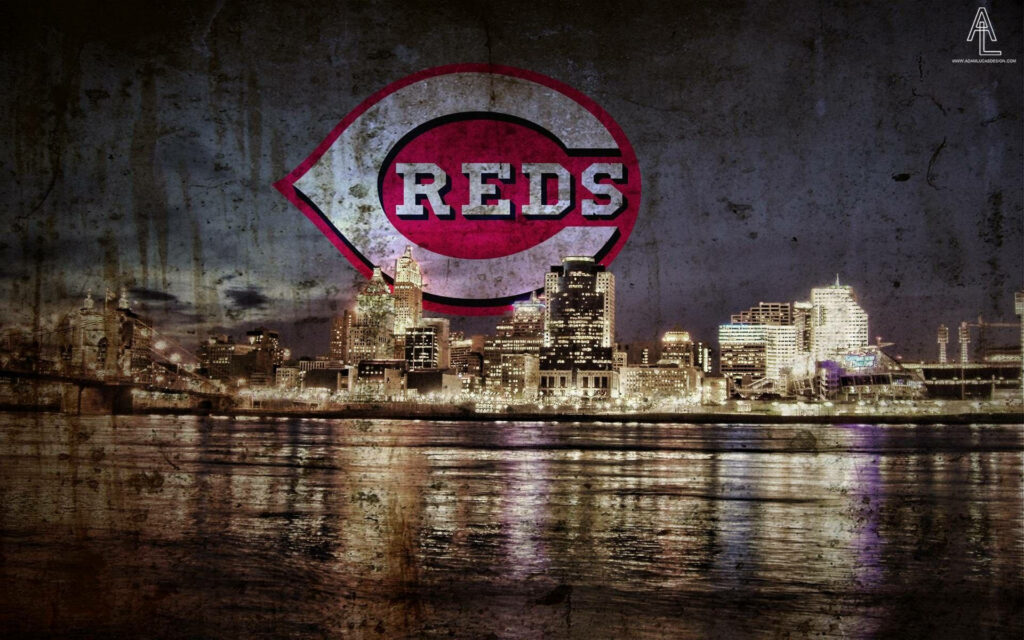 Dramatic Cincinnati Reds logo over nighttime cityscape with river reflections and grunge texture Wallpaper