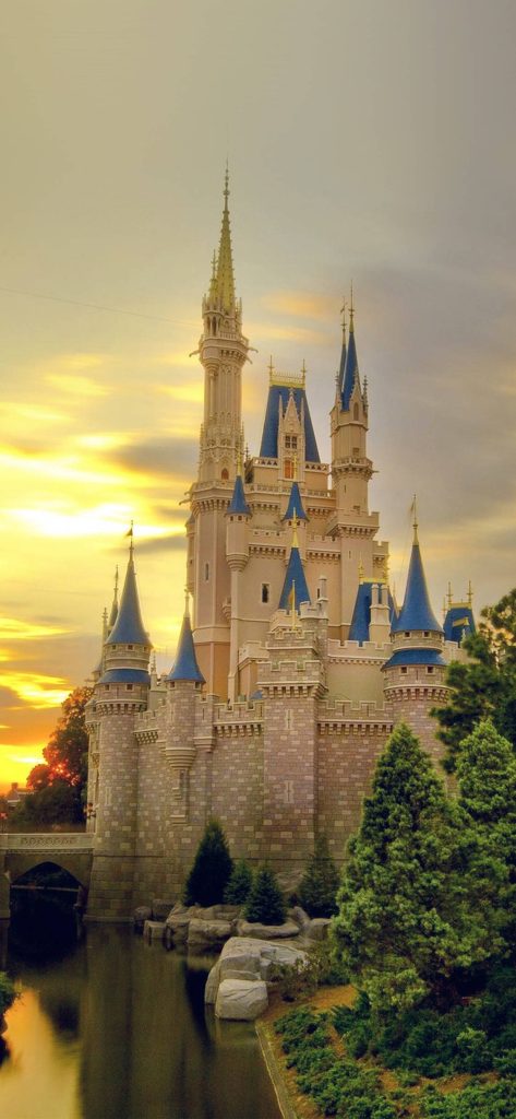 Cinderella Castle at Walt Disney World sunset wallpaper golden glow serene Magic Kingdom view
