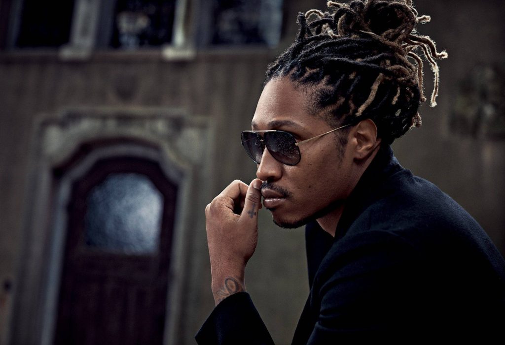 Future rapper sharp side-profile portrait in aviator sunglasses with rustic backdrop wallpaper