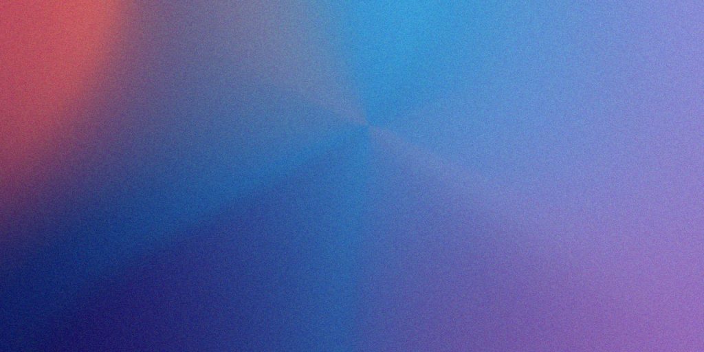 Abstract digital wallpaper with smooth cinematic gradient in blue purple and red tones