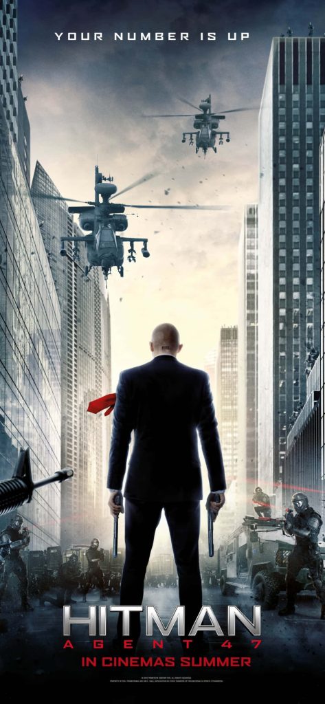 Hitman Agent 47 wallpaper showing assassin in suit with pistols in urban street with soldiers and helicopters