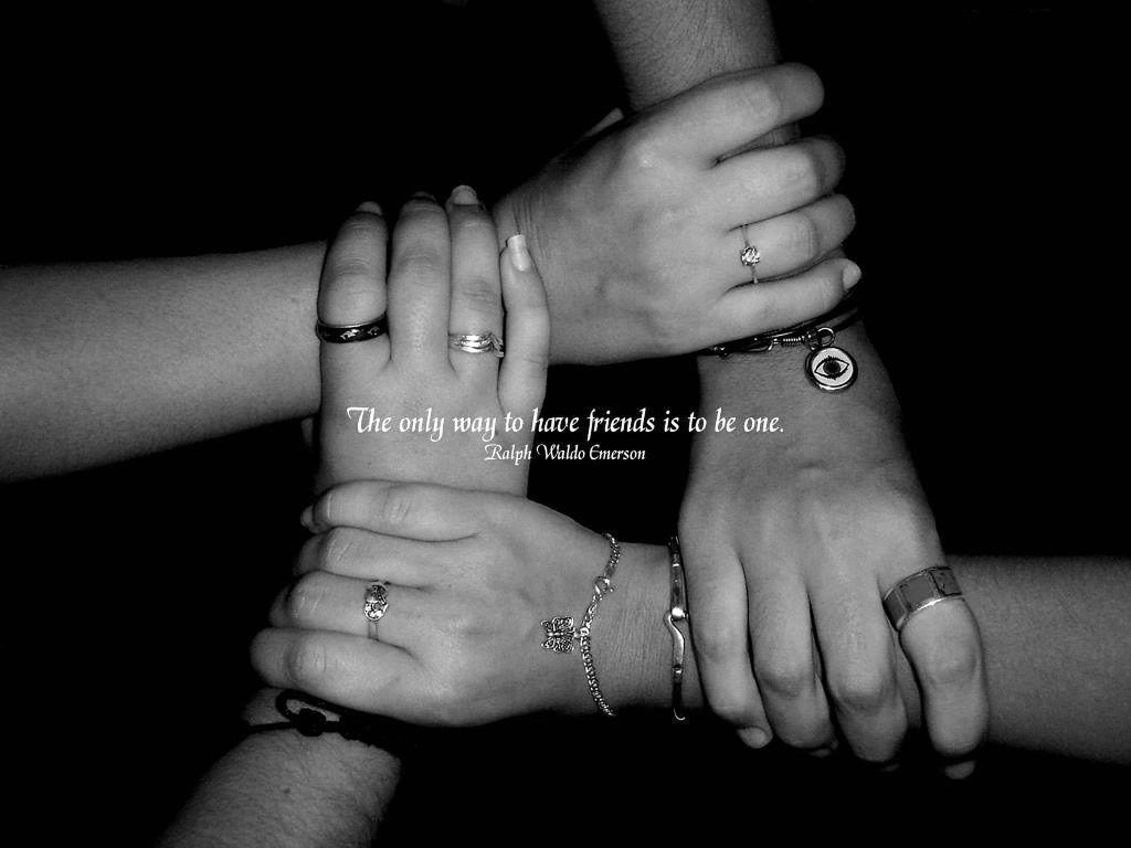 Black and white wallpaper of four joined hands with rings and Emerson friendship quote background