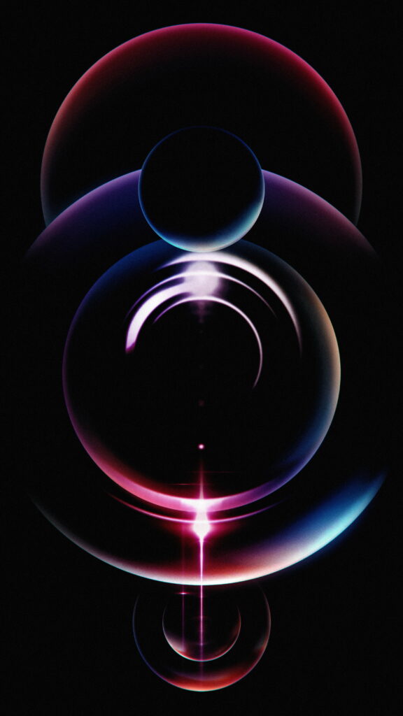 Abstract glossy pink and blue spheres on black background iPhone 15 official stock wallpaper