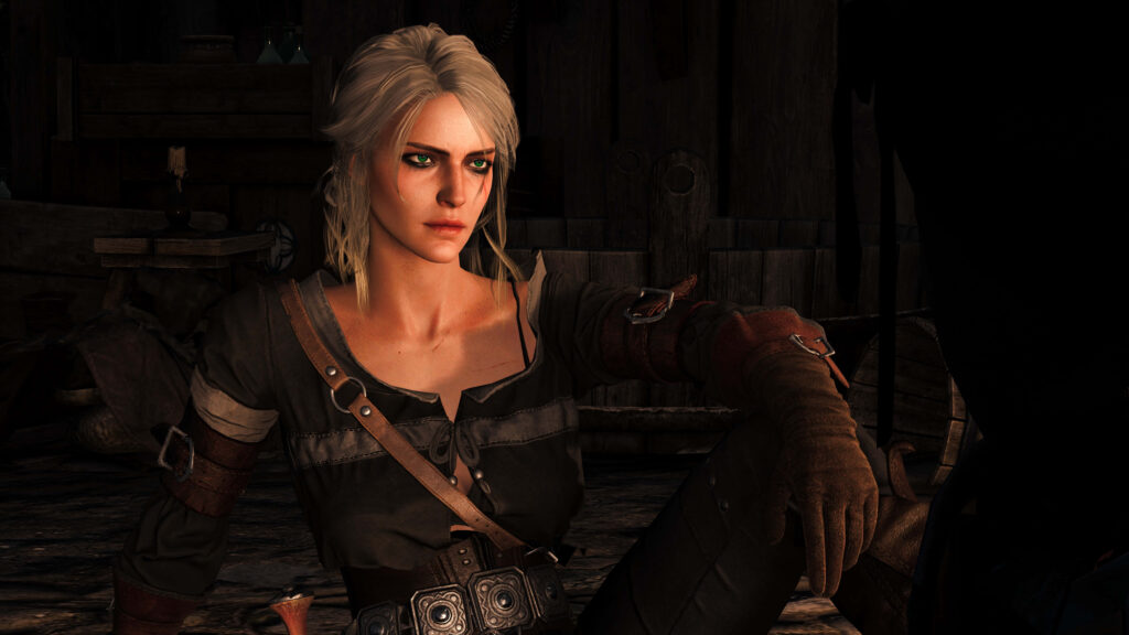 Ciri from The Witcher sitting alert in detailed leather armor with silver hair in medieval setting Wallpaper