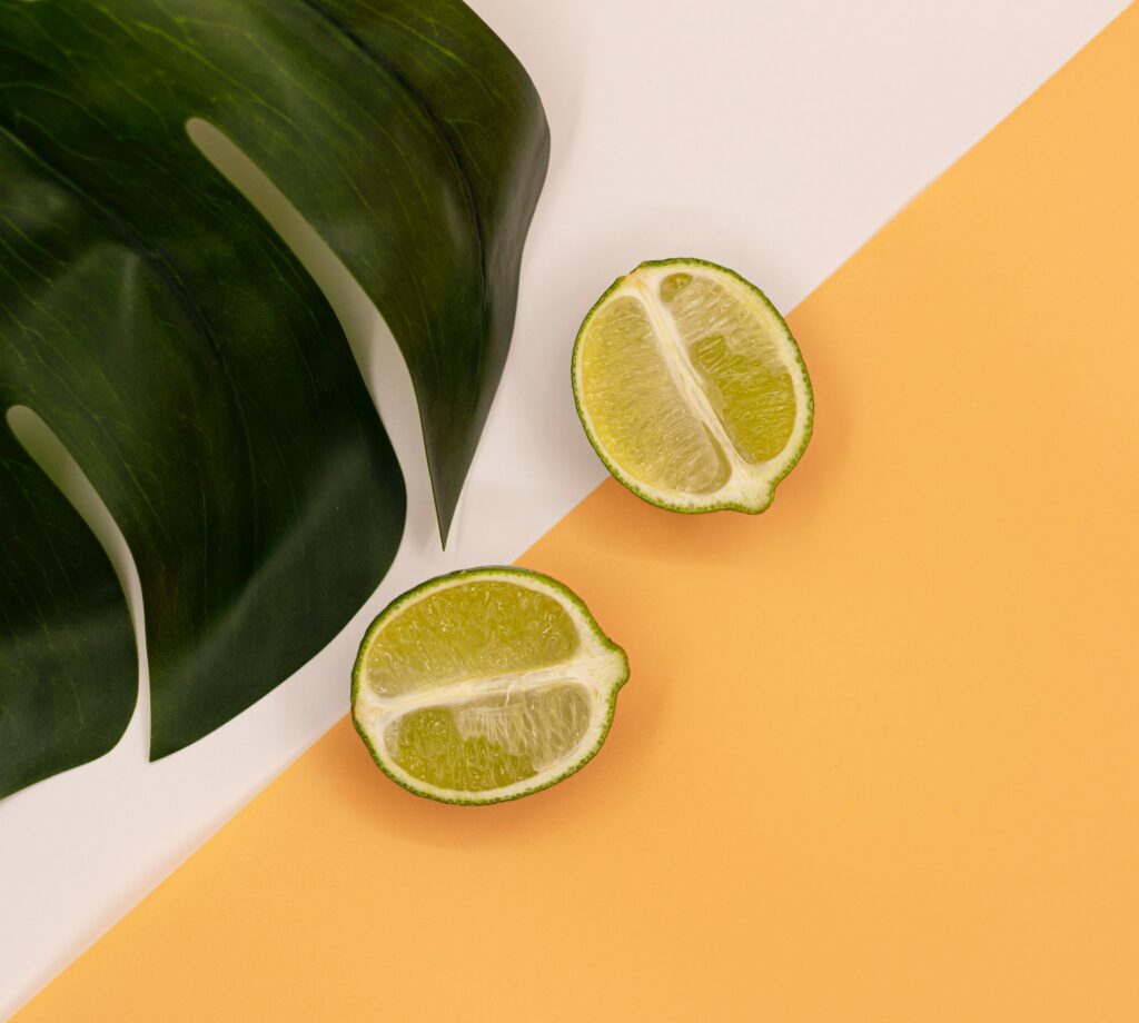 Vibrant Lime & Tropical Leaf Wallpaper: Refreshing Citrus Blend