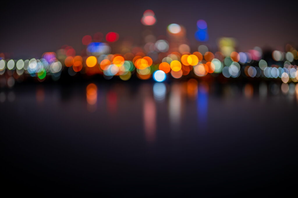 Mystical Cityscape: Mesmerizing Bokeh Lights in a Blurred Glare Wallpaper
