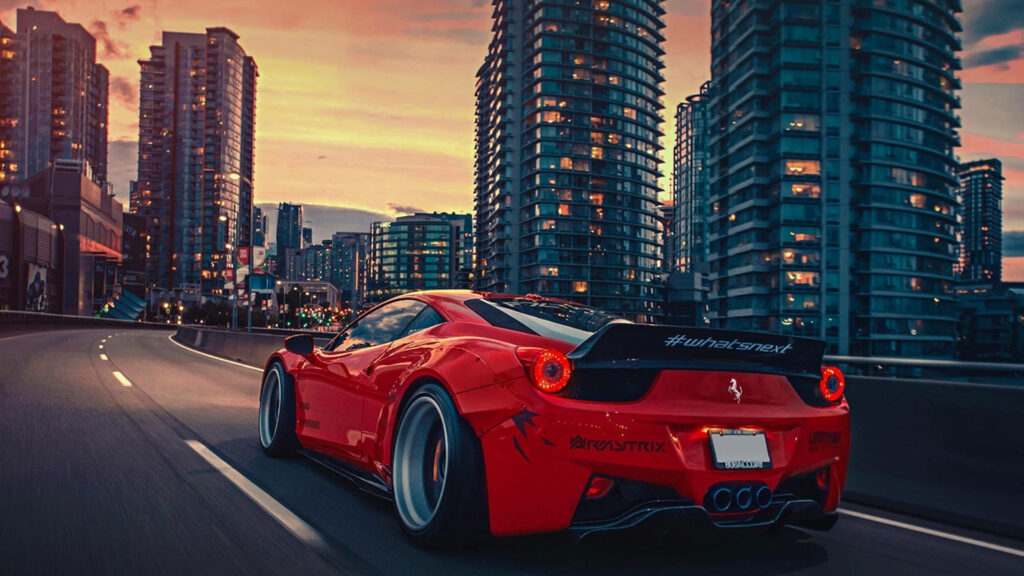 Revving Through the Metropolis: Red Ferrari iPad Wallpaper