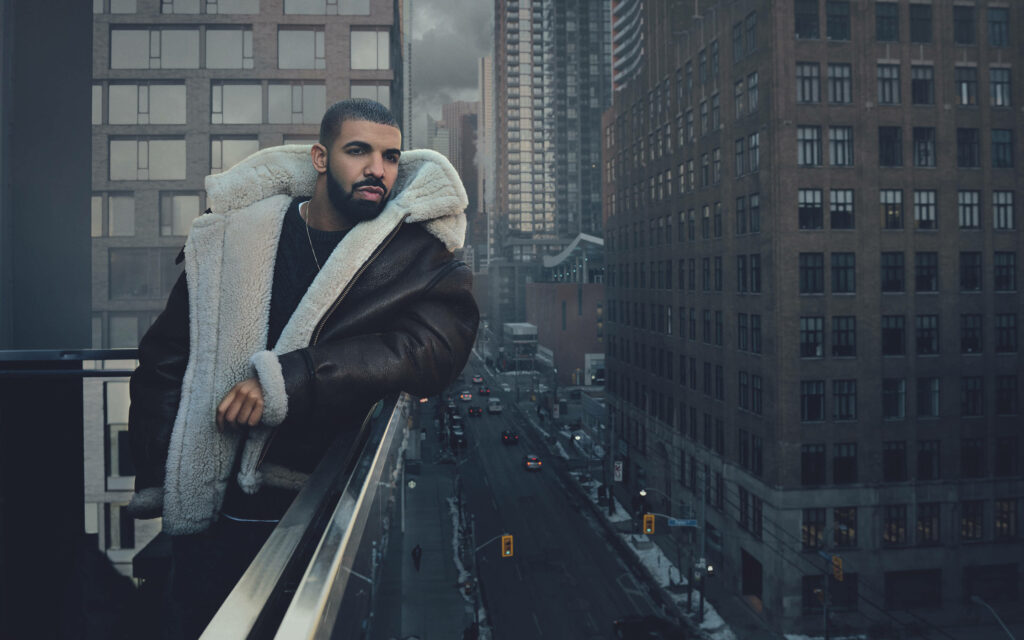 Drake's Winter Wonderland: A Splendid Cityscape View from the Rooftop Wallpaper