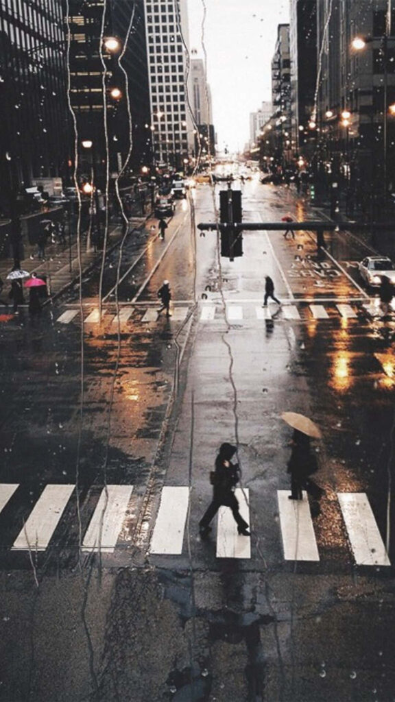 Rainy Urban Cityscape Wallpaper for iPhone: Captivating & Illuminated