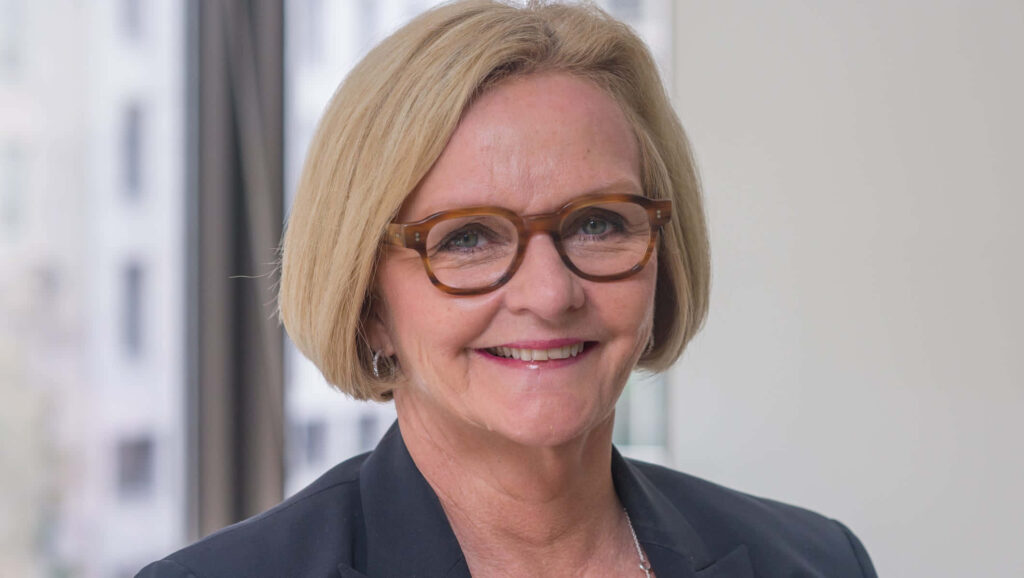 Claire McCaskill portrait wallpaper with warm smile soft lighting and professional poised appearance