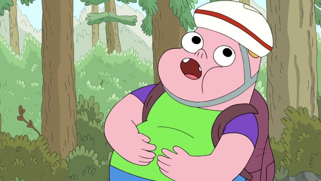 Clarence Cartoon Network character with white helmet and backpack exploring lush forest wallpaper