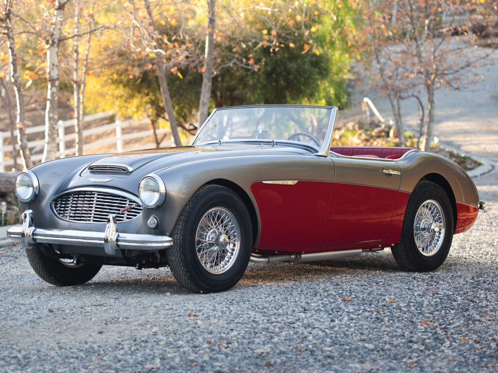 Classic 1959 Austin Healey 3000 Convertible in Scenic Outdoor Setting Wallpaper