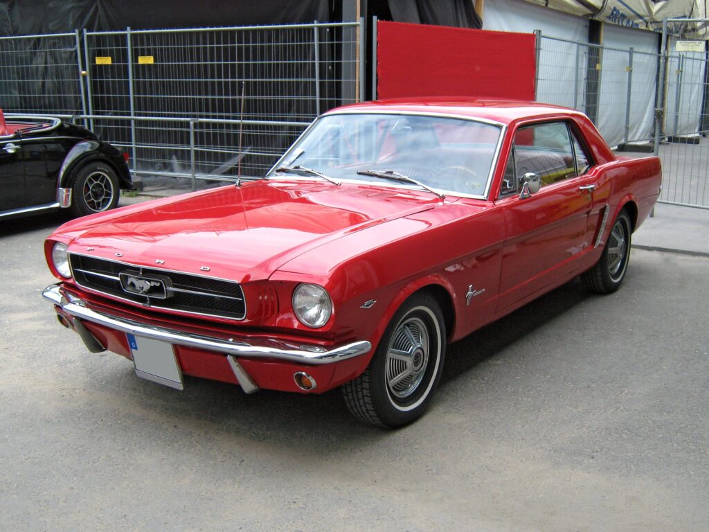 1965 Ford Mustang Hardtop Wallpaper - Iconic Red Design Background