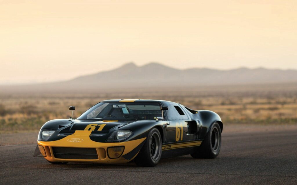 1966 Ford GT40 Wallpaper: Classic Sports Car in Desert Background
