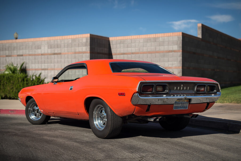 Classic Red 1974 Dodge Challenger: Urban Backdrop Wallpaper