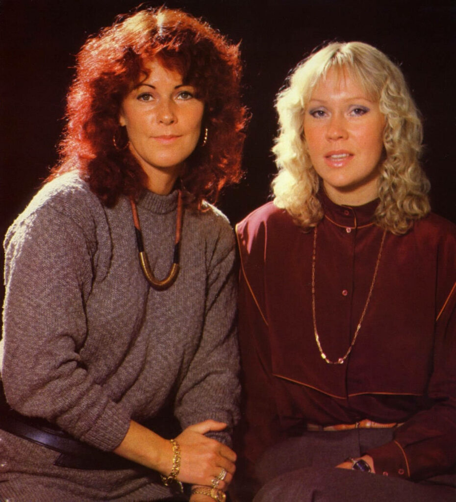 Classic ABBA portrait of Agnetha and Anni-Frid showcasing iconic 70s music group style wallpaper