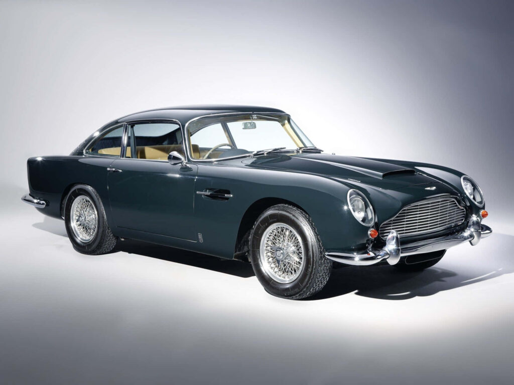 Classic Aston Martin DB5 vintage British car wallpaper showcasing timeless automotive elegance