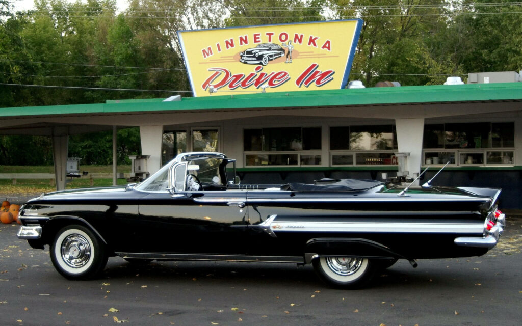 Stylish Black Convertible at Vintage Minnetonka Drive-In Wallpaper