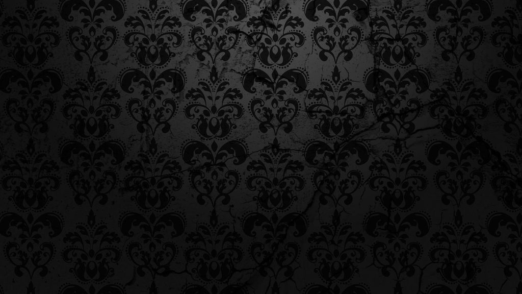 Classic black damask pattern on cracked distressed texture dark moody elegant gothic wallpaper background