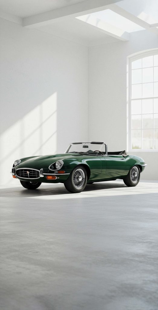 British Racing Green Jaguar E-Type roadster in white studio showcasing classic convertible curves Wallpaper