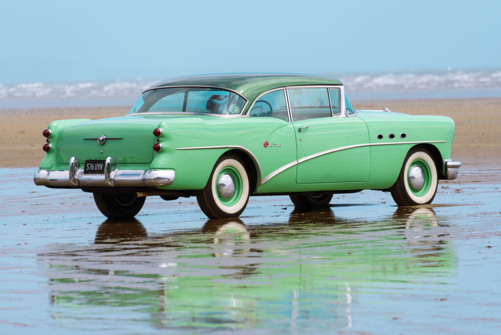 Classic Buick Century Wallpaper: Retro Style at the Beach