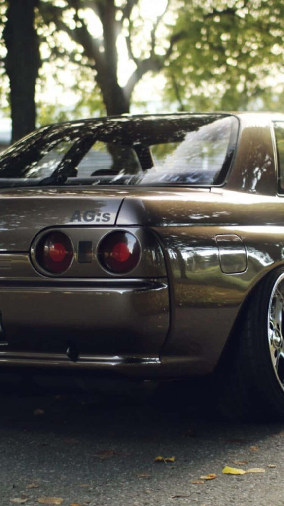 Classic car close-up under trees calm charming scene perfect cute cars iPhone wallpaper background