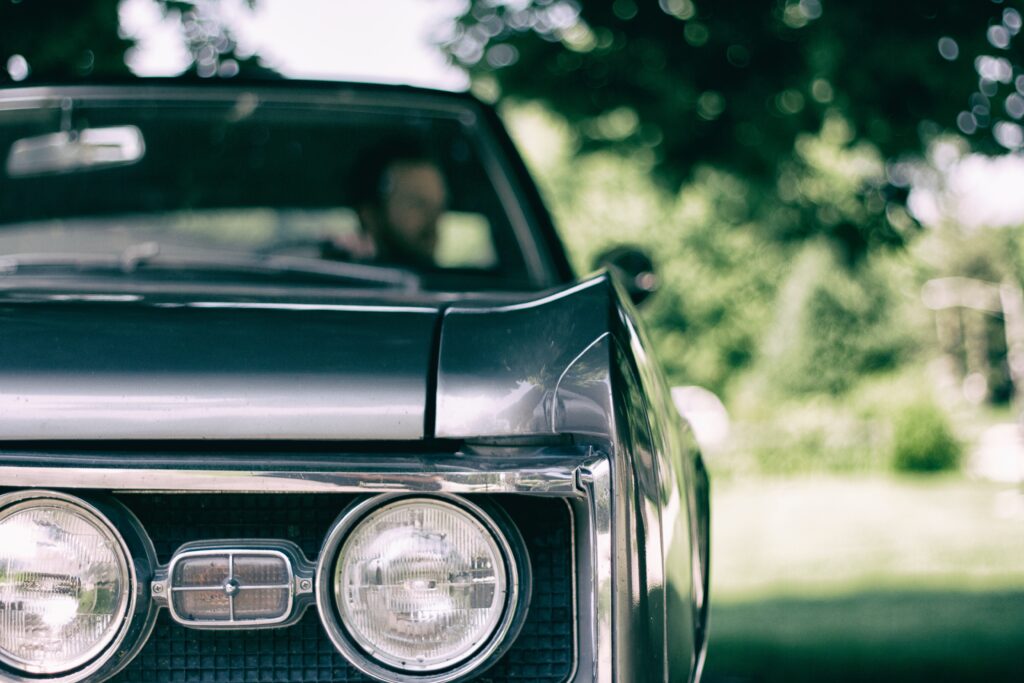 Classic Car Front View Wallpaper: Vintage Style & Distinct Headlights