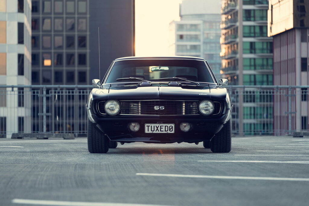 Classic Chevrolet Camaro Wallpaper - Iconic Design & Urban Background