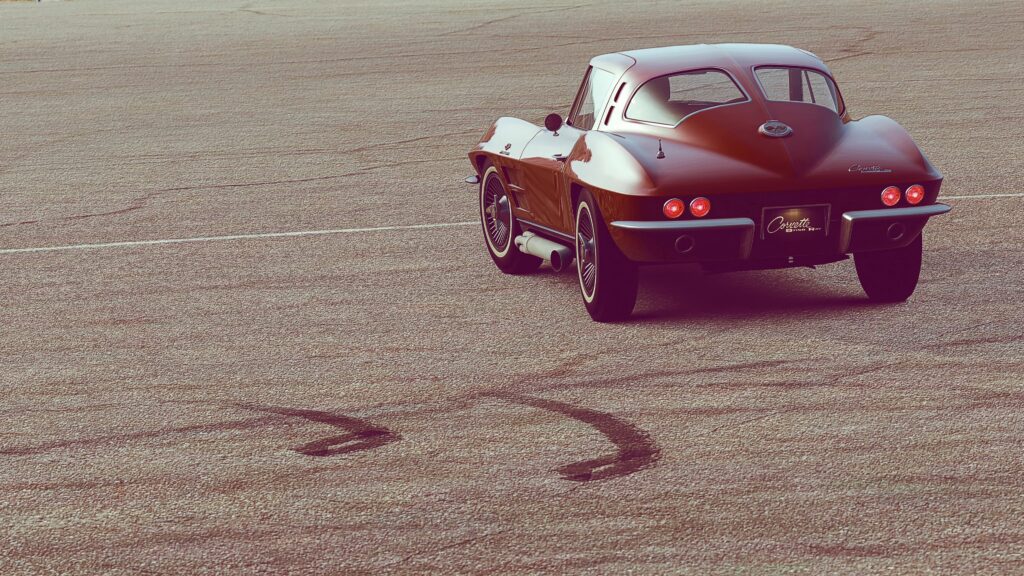 Retro Chevrolet Corvette Wallpaper: Classic Design on Open Road