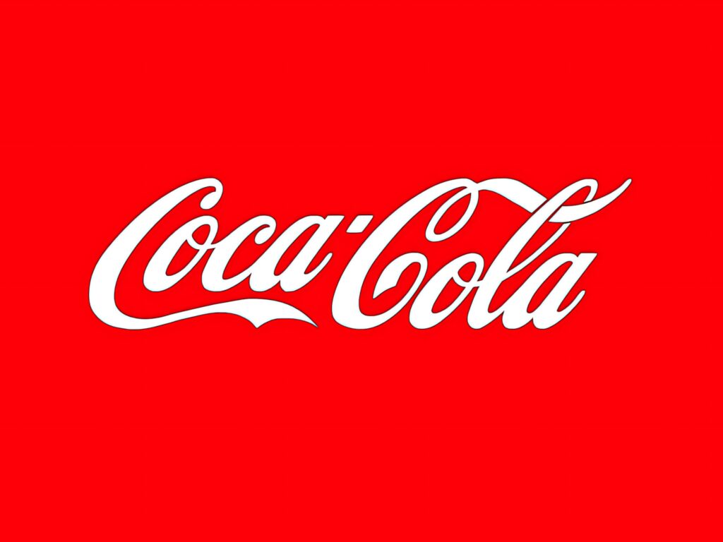Coca-Cola logo centered on vibrant red background iconic classic branding wallpaper design