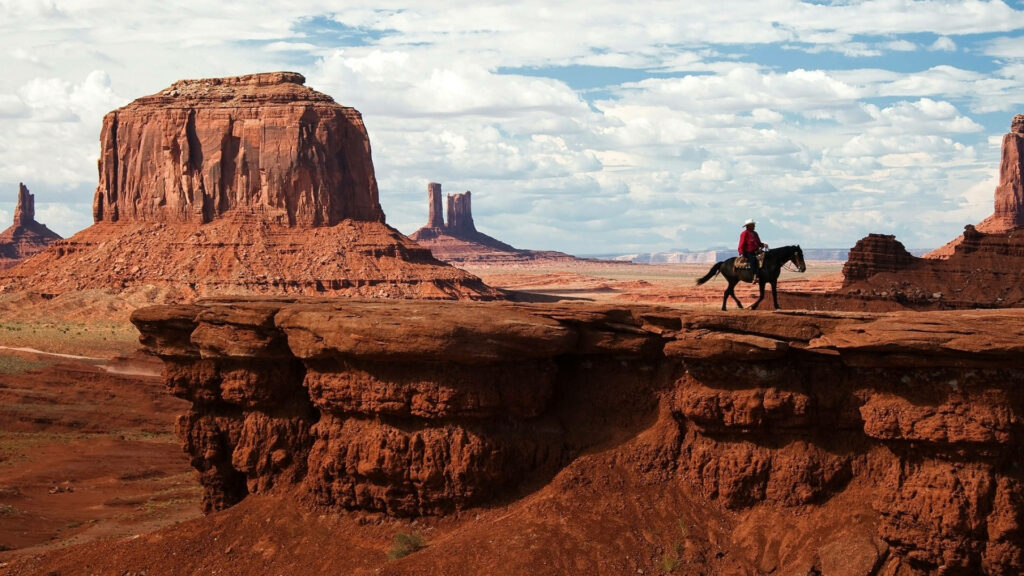 Classic Cowboy Wallpaper: Wild West Adventure in Desert Landscape