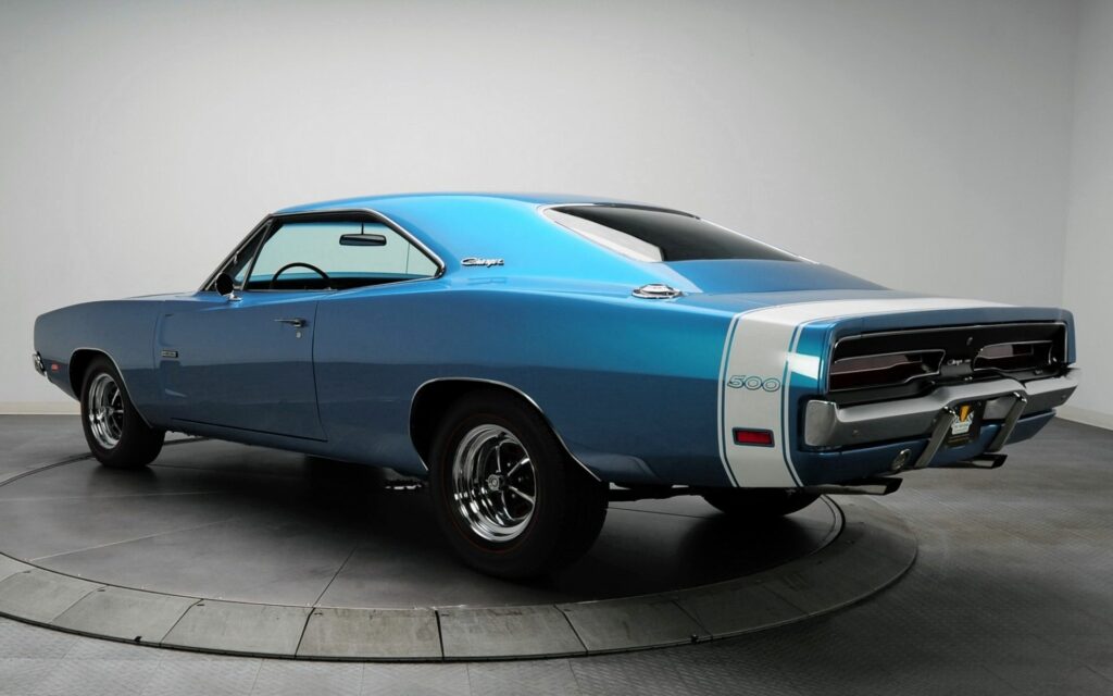 Classic Dodge Charger in Stunning Metallic Blue - Vintage Muscle Car Wallpaper