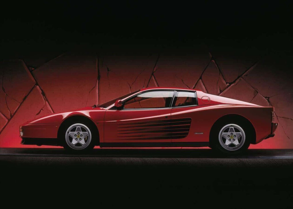 Exquisite Red Ferrari Testarossa: A Captivating Masterpiece Against Nature's Canvas Wallpaper