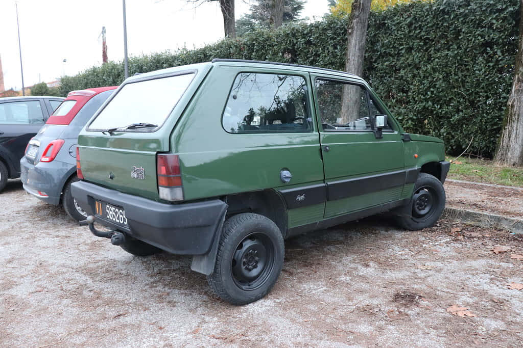 Classic Fiat Car Wallpaper: Italian Charm in Serene Nature
