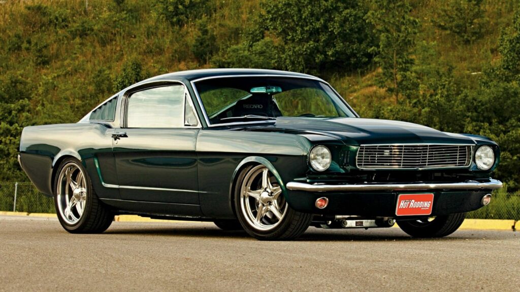Classic Ford Mustang Fastback Wallpaper: Iconic Muscle Car Aesthetic