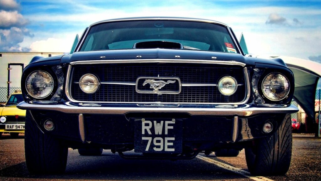 Vintage Ford Mustang Wallpaper: Classic Design & Turbo Power Background