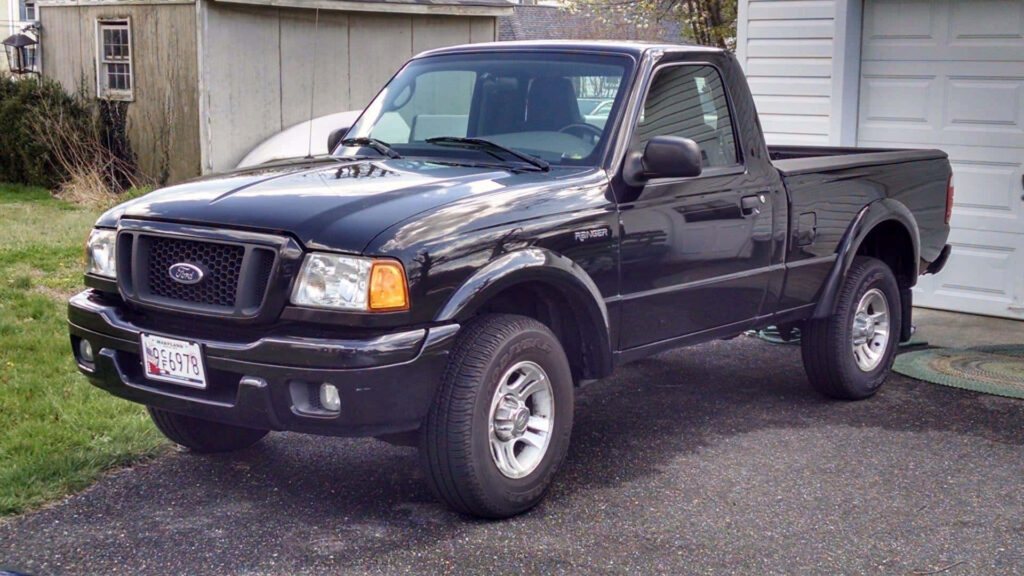 Classic Ford Ranger parked in driveway showing sturdy build and timeless design wallpaper