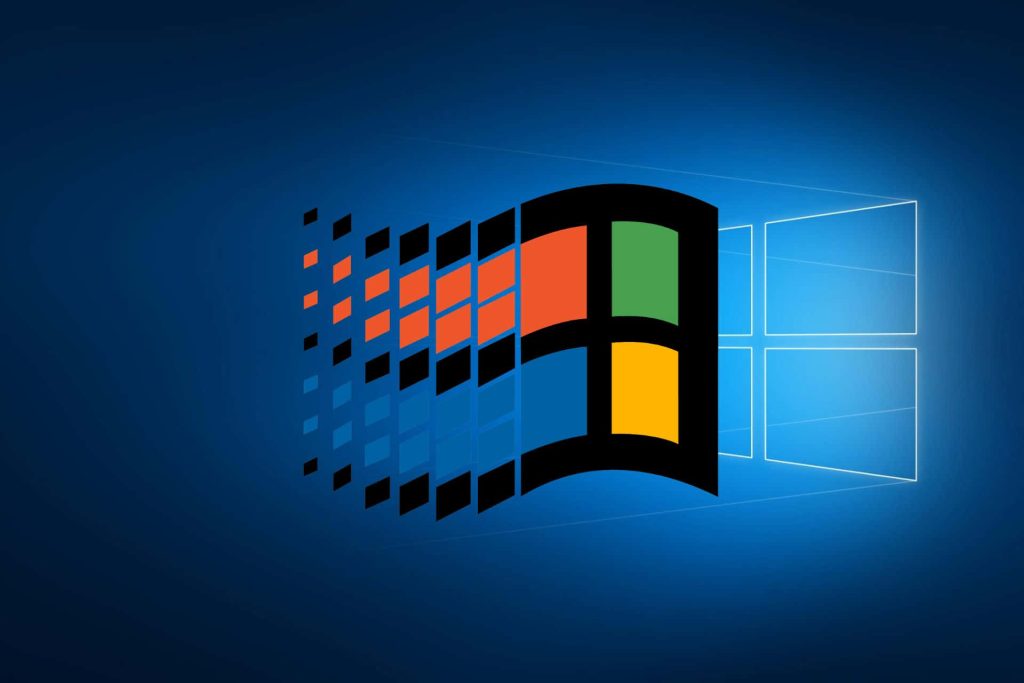 Classic Microsoft Windows logo wallpaper with pixelated flag on vibrant blue background retro style
