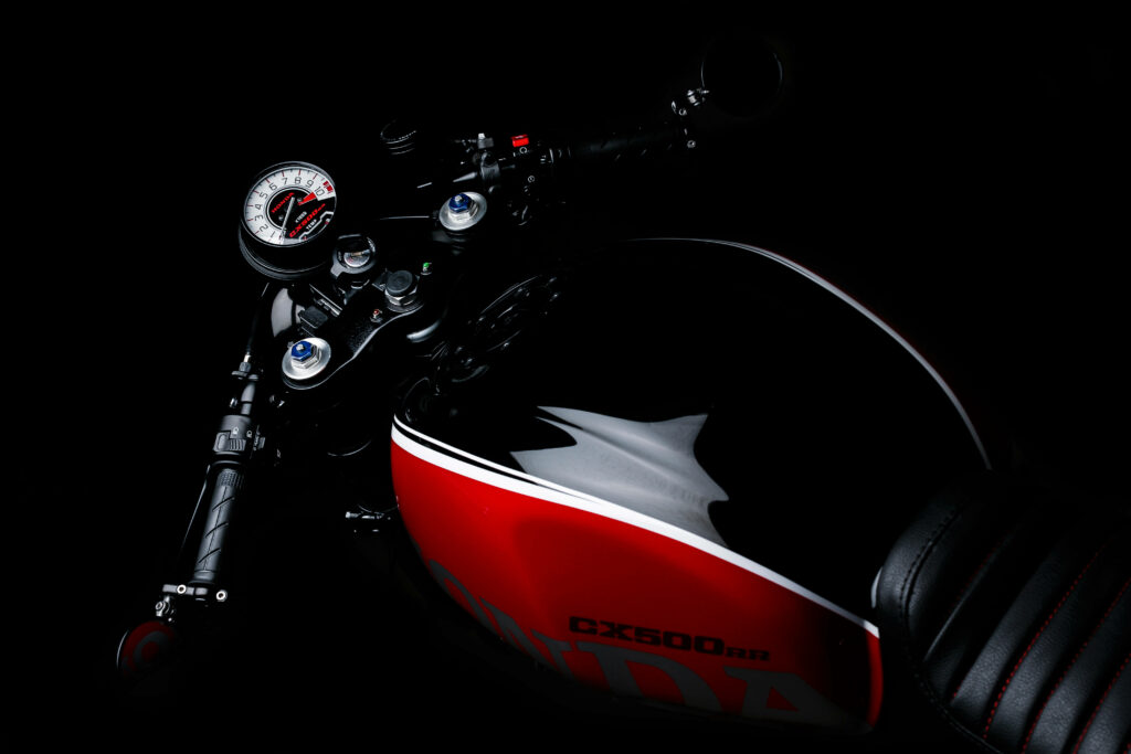 Classic Black & Red Motorcycle Wallpaper: Sleek Design Close-Up