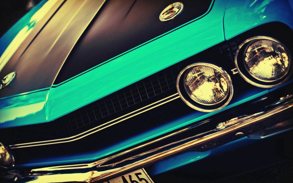 Classic Muscle Car Wallpaper: Bold Turquoise & Black Vintage Design