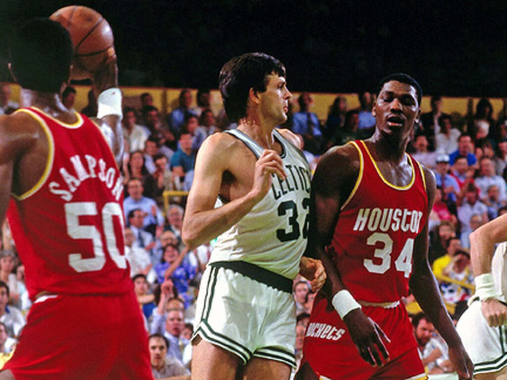 Kevin McHale Celtics vs Hakeem Olajuwon Ralph Sampson Rockets epic 1980s NBA basketball action Wallpaper