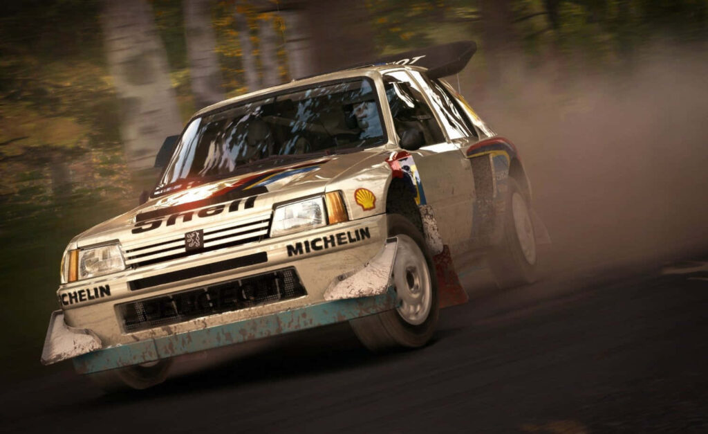 Classic rally car drifting fast on forest dirt track high speed rally wallpaper background